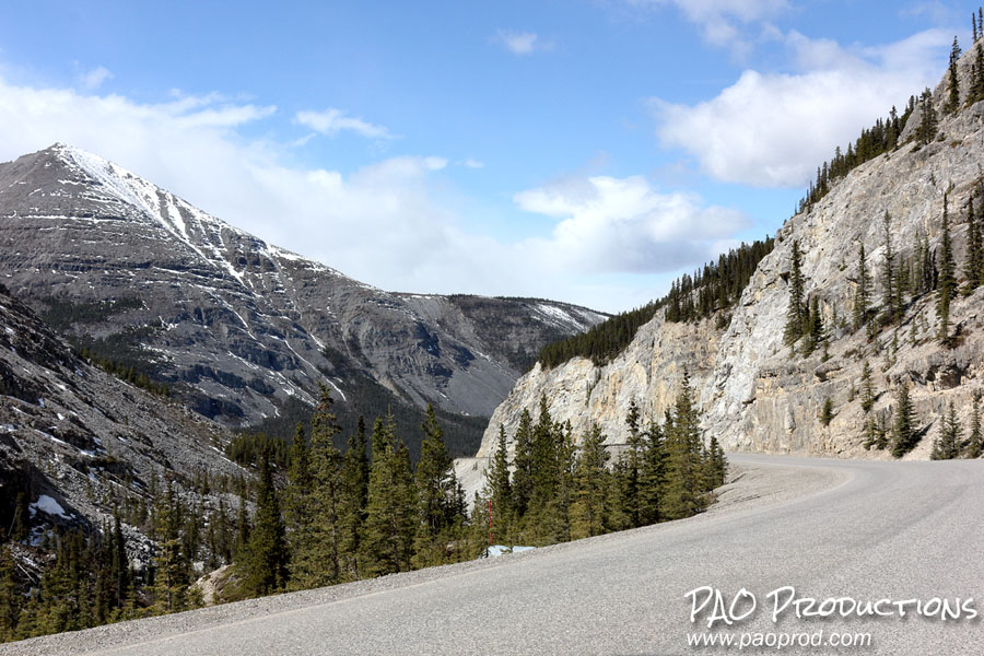 Stretch of un-guardrailed highway near Summit Lake, British Columbia