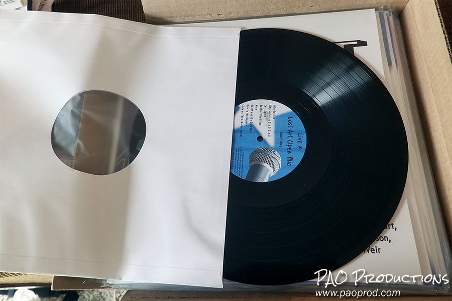Unboxing the Live at Lost Art Open Mic LP in June 2025