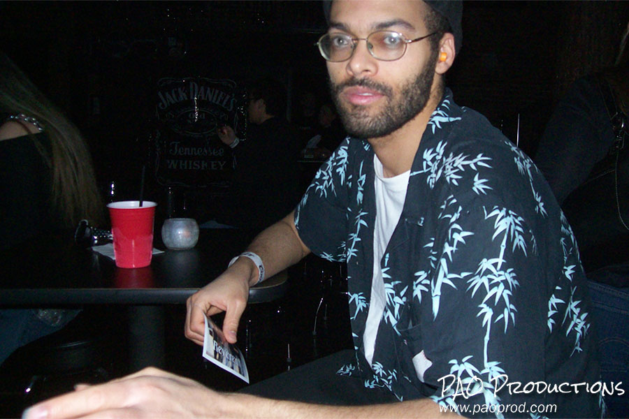 Me holding a Reverent sticker, March 2010