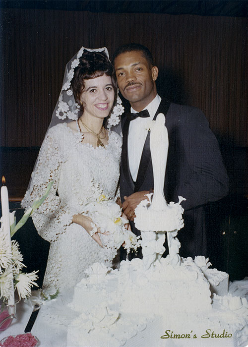 Interracial wedding, likely late 1960s/early 1970s