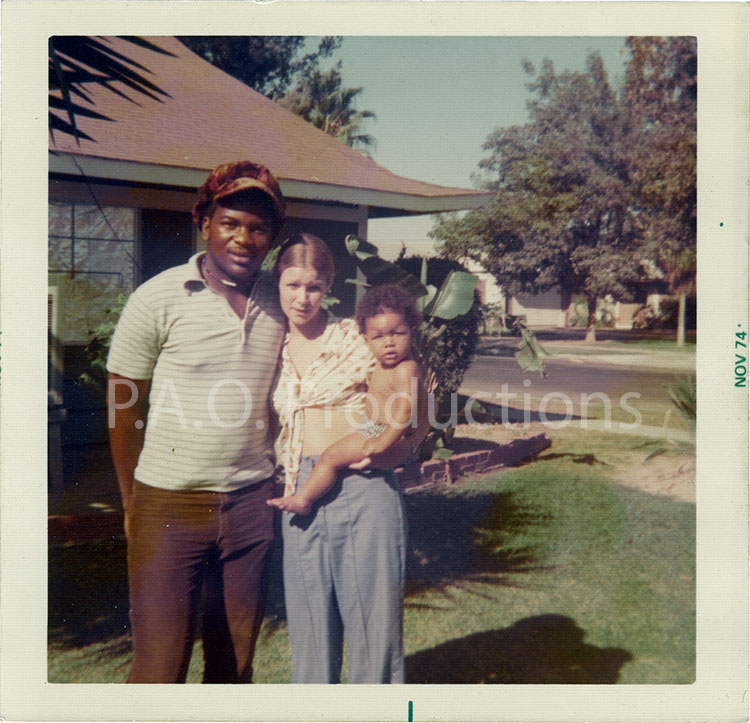 Young interracial family, 1974
