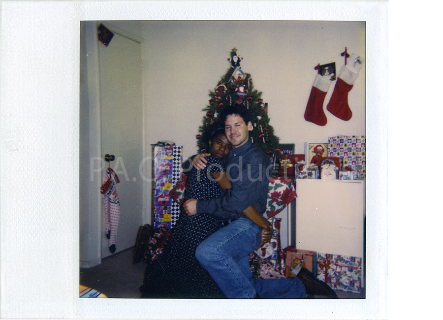 Interracial couple at Christmas, circa 1987