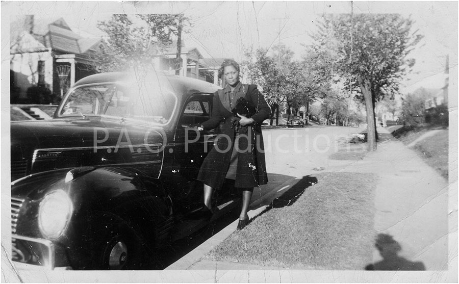 Woman getting into car